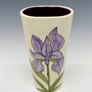 Handmade ceramic vase with hand-painted purple iris flower on cream background