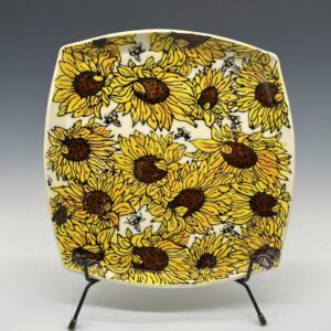 Sunflowers square porcelain plate with embossed and hand-painted yellow sunflower design, front view.