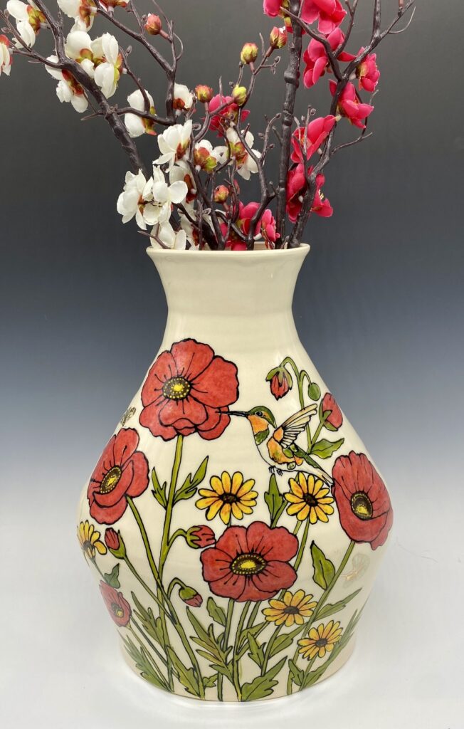 Floral porcelain vase with red poppies and purple daisies
