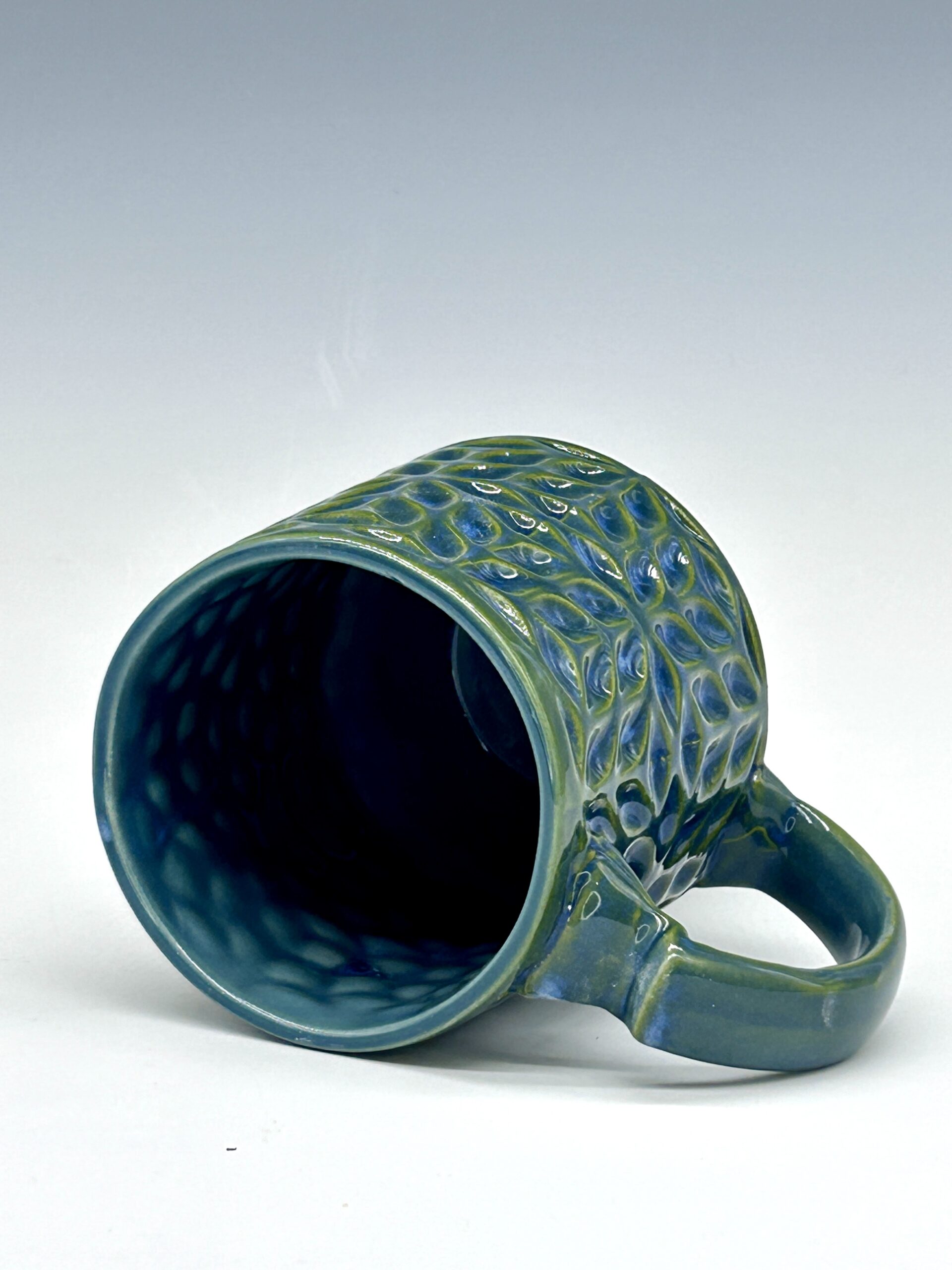 Petal Lattice geometric ceramic mug in blue, teal and moss green, view 2