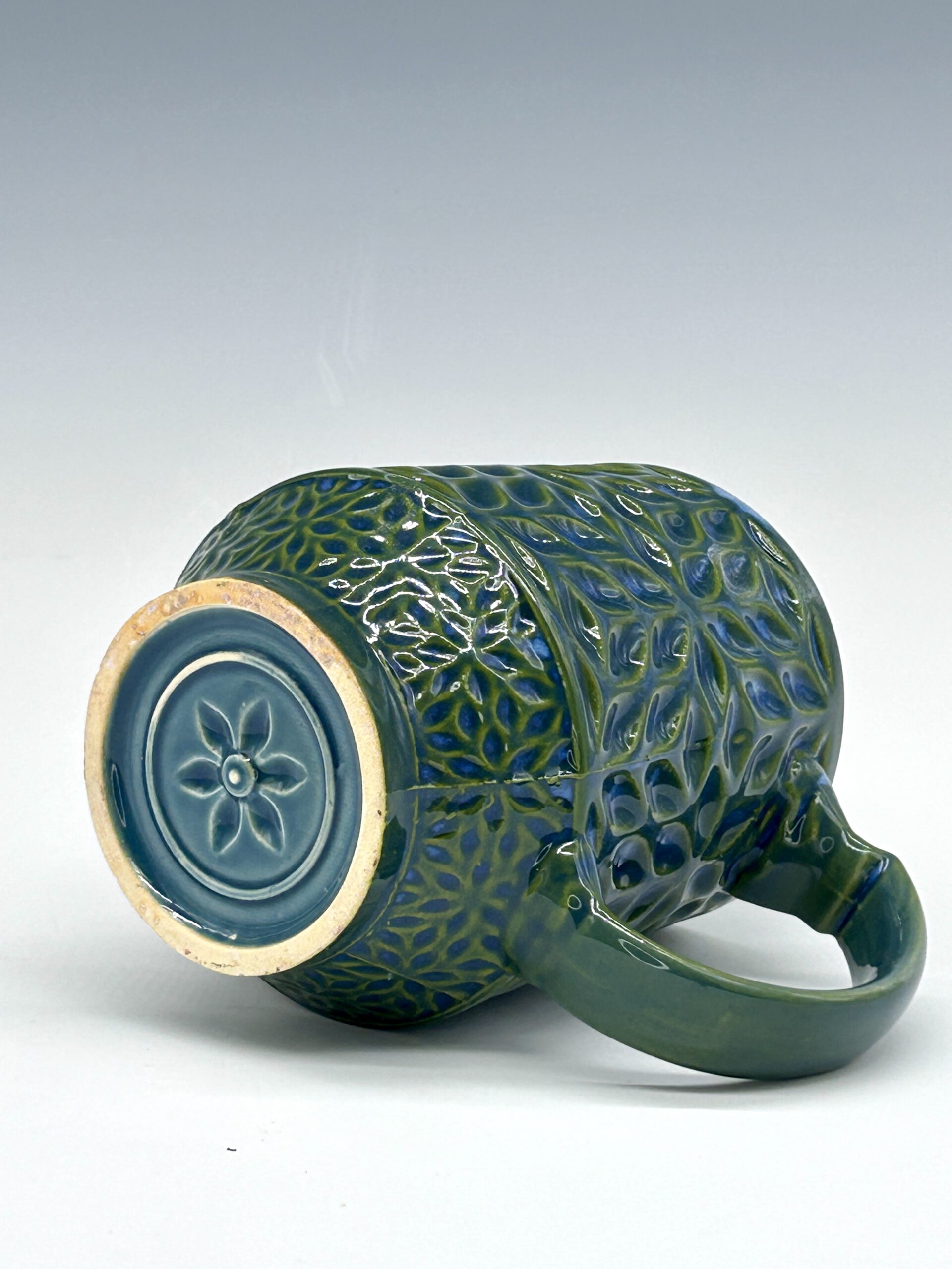 Petal Lattice geometric ceramic mug in blue, teal and moss green, view 3